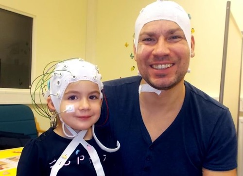 Scientist and young patient