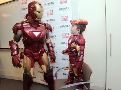 Anthony Smith reminds Iron Man why hearing technology is cool in helping kids hear better