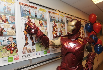 Iron Man acknowledges his own likeness in the Phonak Iron Man poster