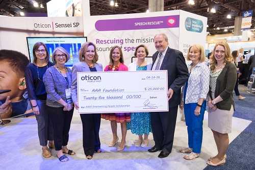 Oticon President Peer Lauritsen presented a $25,000 donation