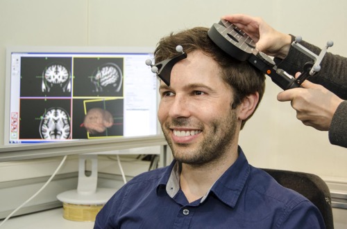 Patient with a brain scanning instrument