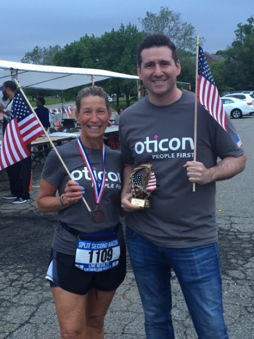  Pam Dorn David Horowitz display individual and team awards from the June 13 race