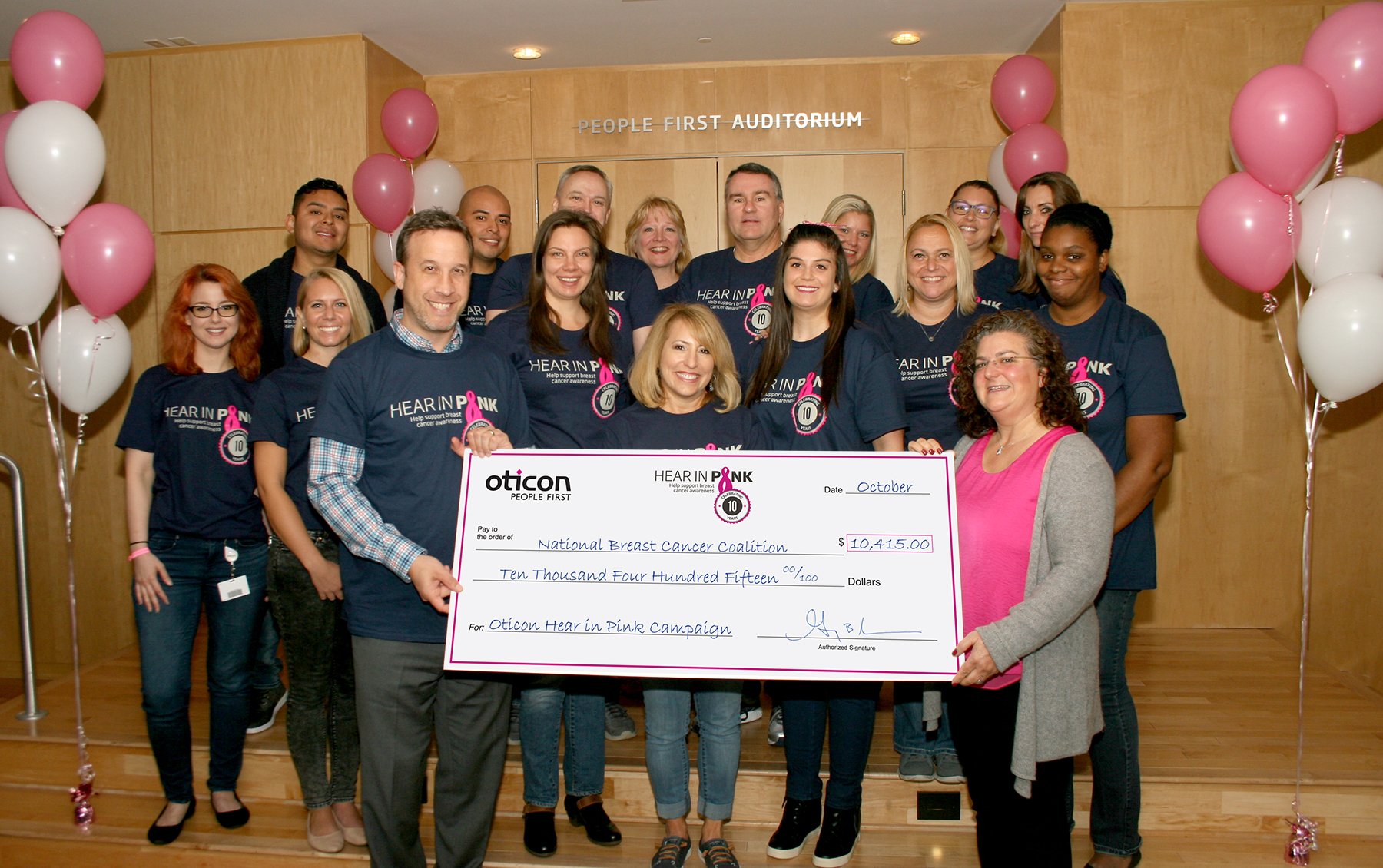 Oticon President Gary Rosenblum celebrates success of the Oticon “Hear in Pink” Campaign
