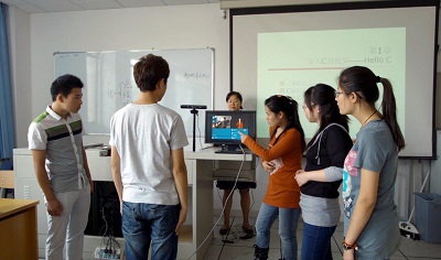 Students of the special education school at Beijing Union University try out the Kinect Sign Language Translator prototype