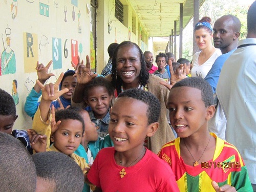 Catherine Clark with children and adults in Ethiopia with hearing loss