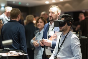 Attendees with a VR headset on