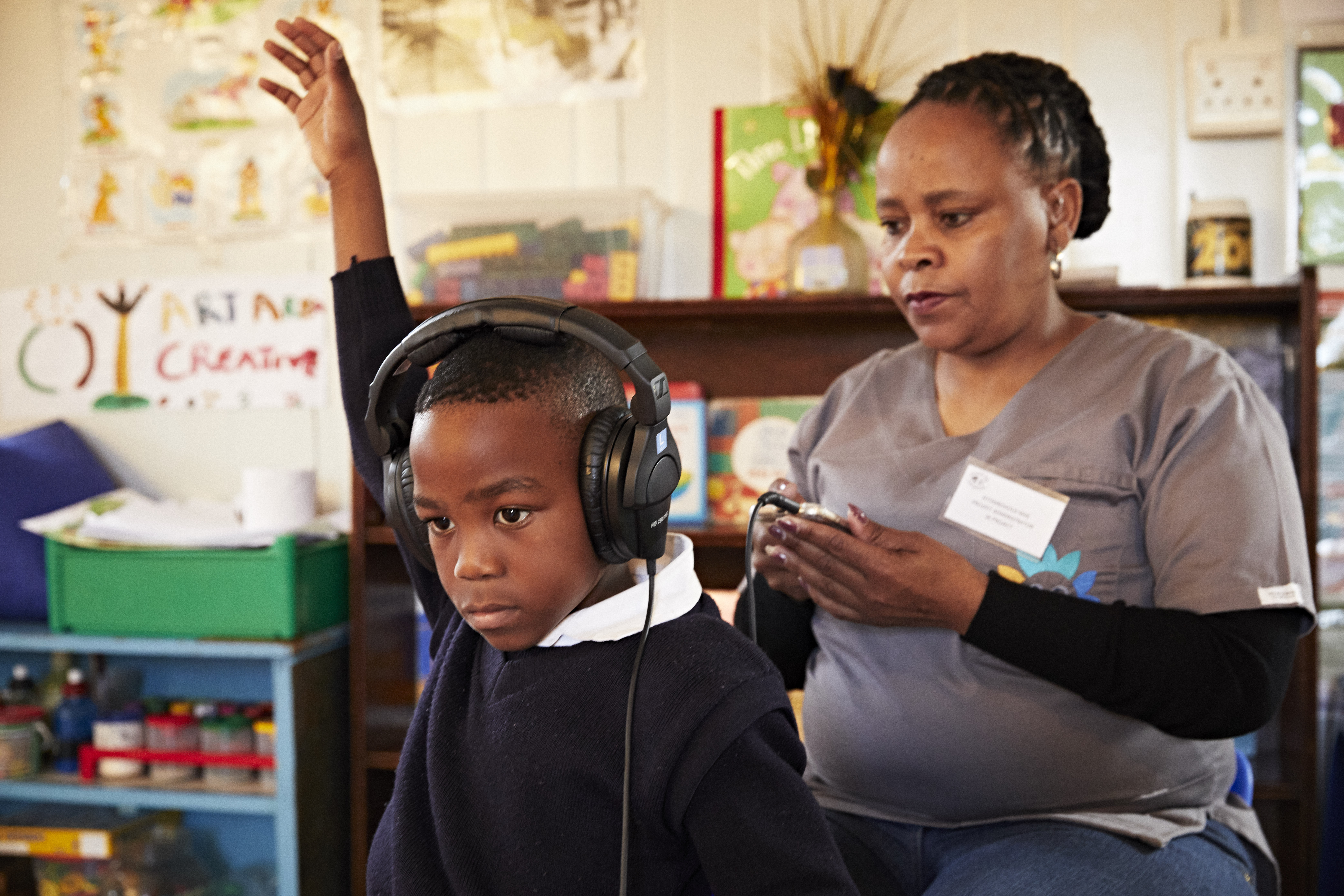 Doctor and patient with hearing test equipment