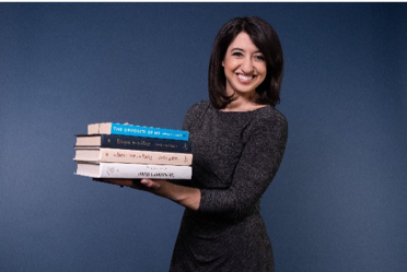 Lori Rakita AuD with books