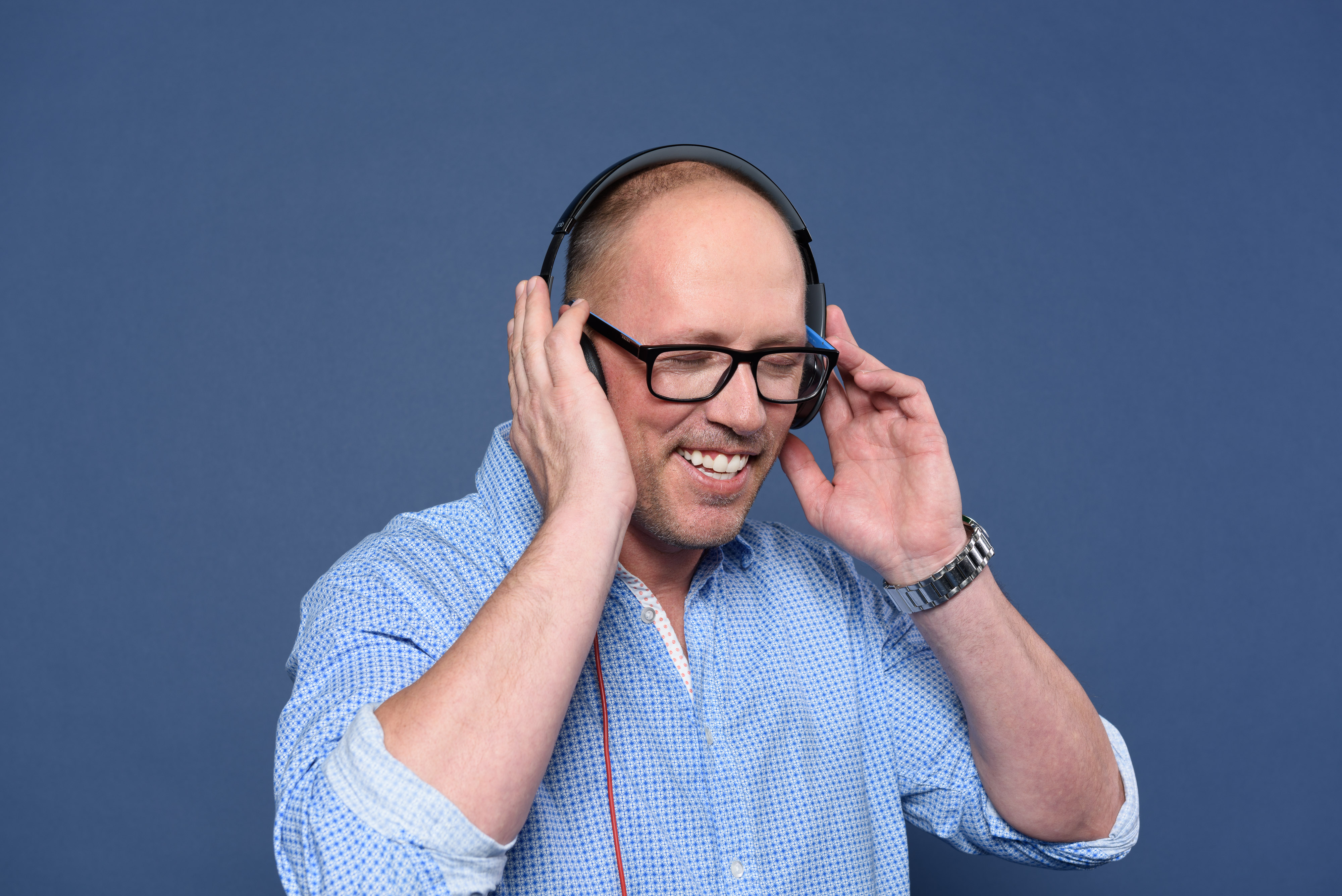 Bradley Stephenson AuD with headphones