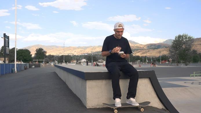 Man Sitting on Ledge