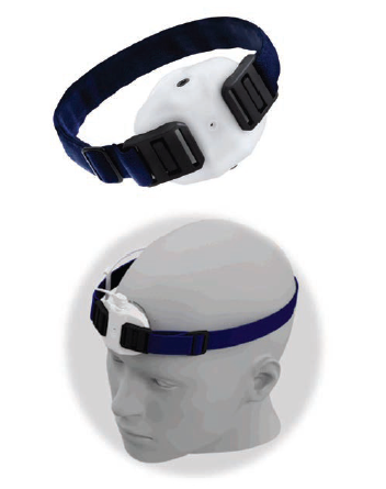 A patient wearing a headband with a prototype surface microphone positioned on the forehead for real bone measurement.