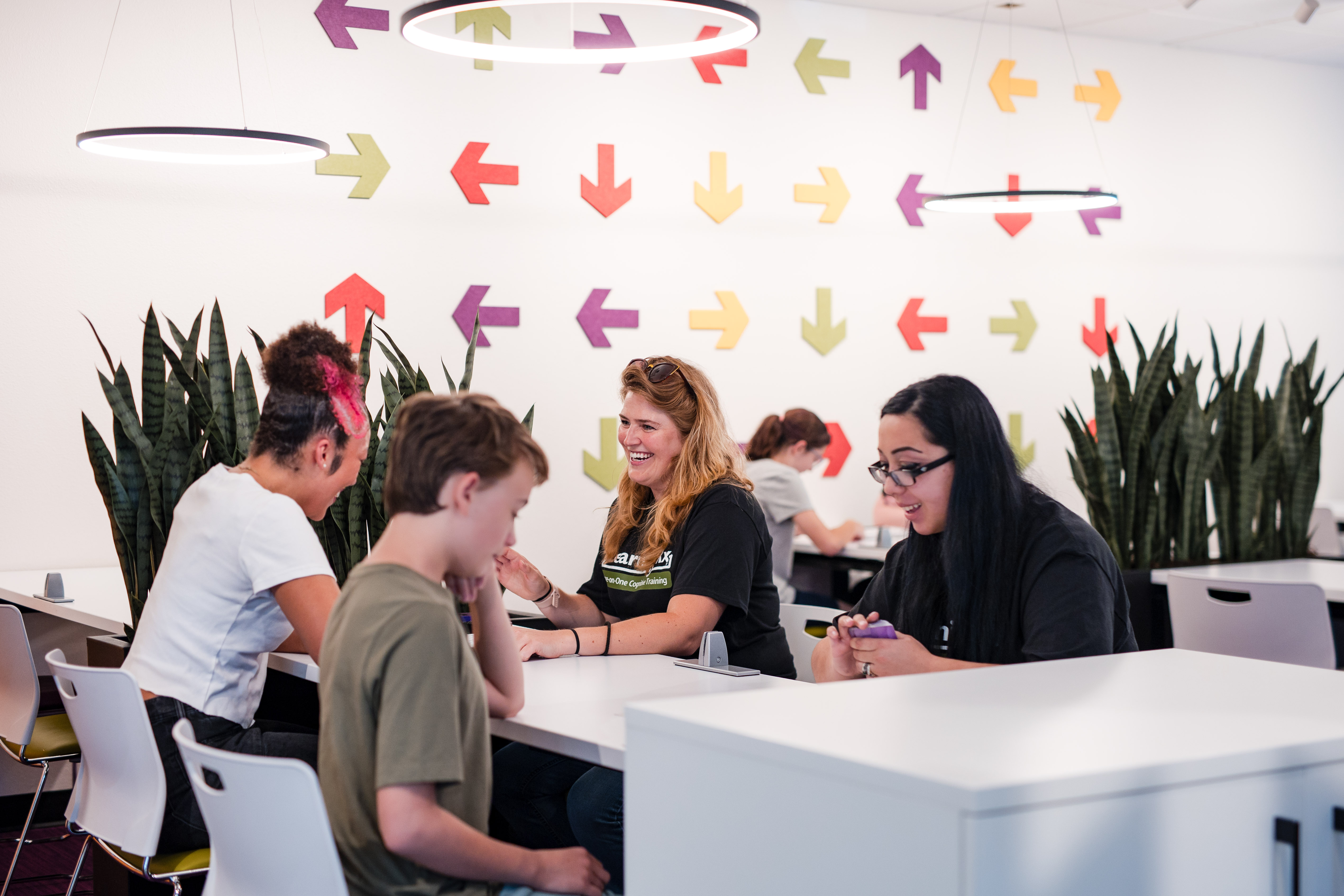 team members working with patients